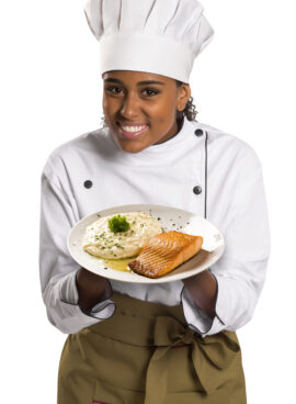 Female Chef With Tray Of Food In Hand. Isolated On White