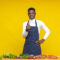 portrait of an african chef smiling and giving a thumbs up gesture